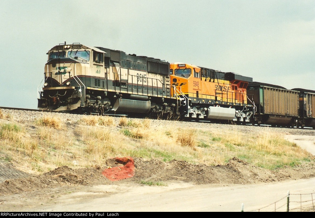Loaded coal train climbs south